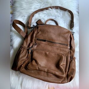 Leather backpack.
